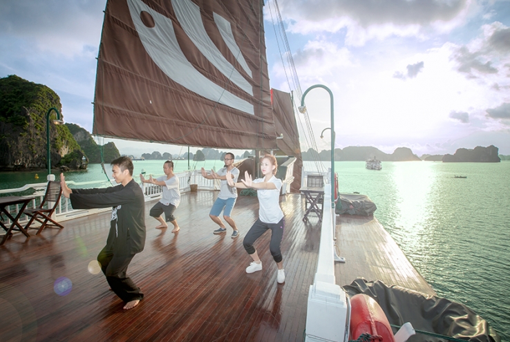 Halong Bay activities - Tai Chi, photo by Bhaya Cruises