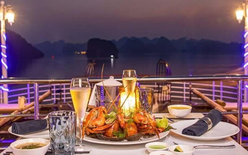 Dining while cruising Halong Bay - Bhaya Cruises